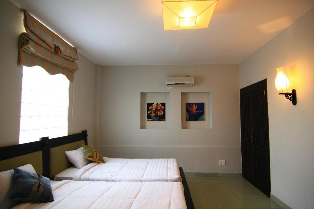Faifoo Boutique Hotel TP. Hồ Chí Minh Phòng bức ảnh